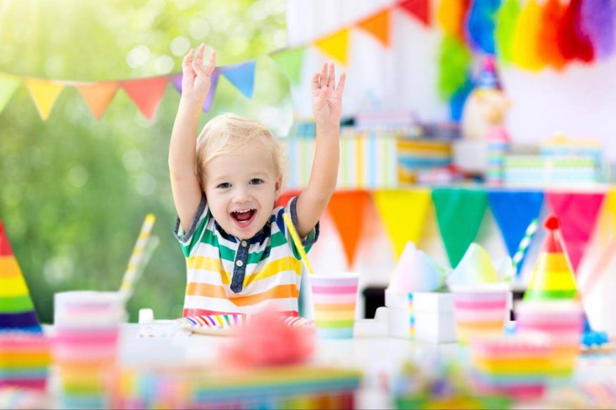 Happy kid in a birthday party