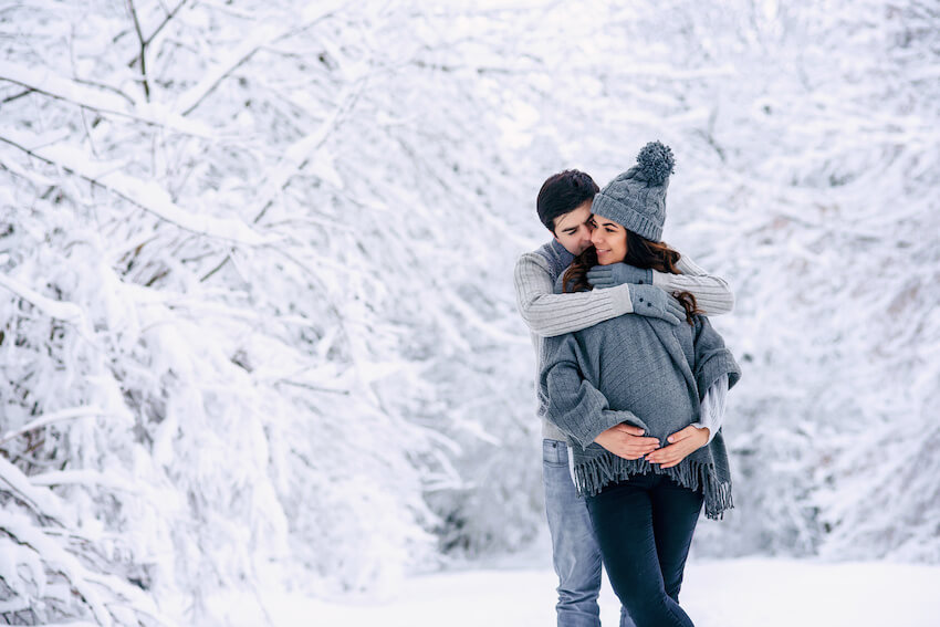 Husband hugging his pregnant wife