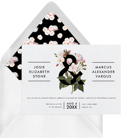 Flowers on white wedding invitation