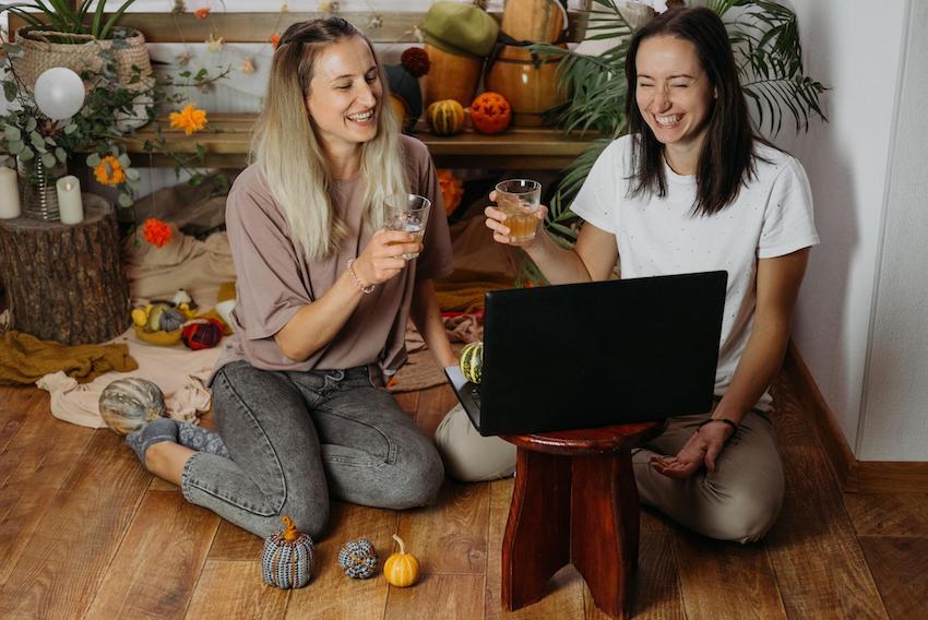 Two women having virtual gathering