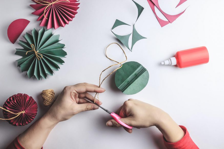 Woman making DIY party decorations