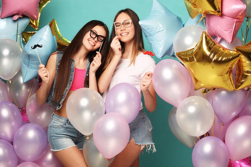 ladies decorating balloons