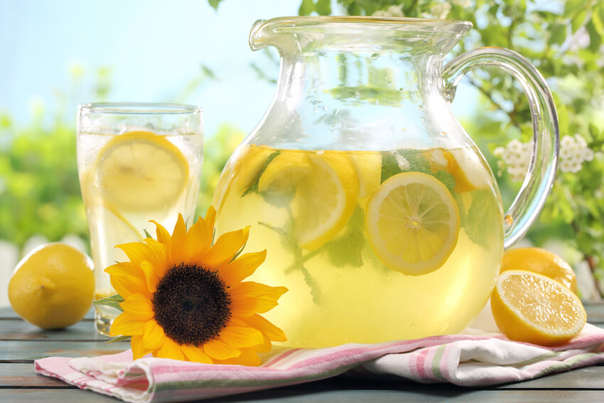 Sunflower baby shower: jug of lemonade on a table