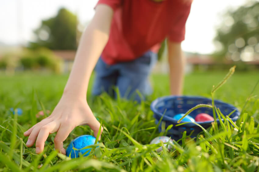 Kid picking-up an Easter egg