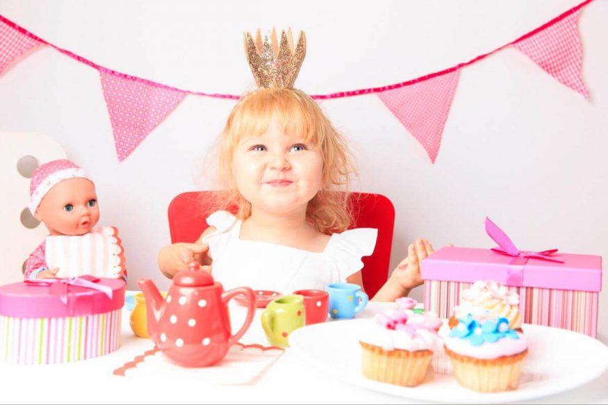 2nd birthday party ideas: kid wearing a tiara