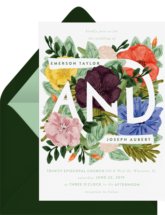 Floral wedding invitation examples with watercolor flowers surrounding the name of the couple