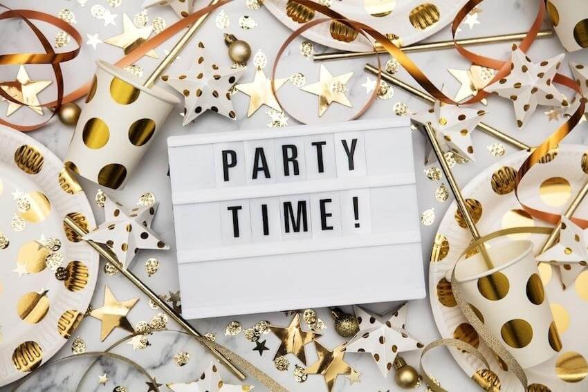 Masquerade party ideas: party time sign on a white board