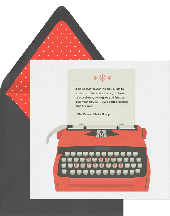 A card that features a type writer with room for one of the longer Christmas card greetings