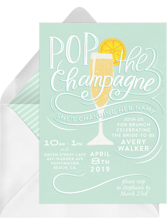 Bridal shower invitation wording: an invitation that reads, "Pop the Champagne, She's Changing Her Name"