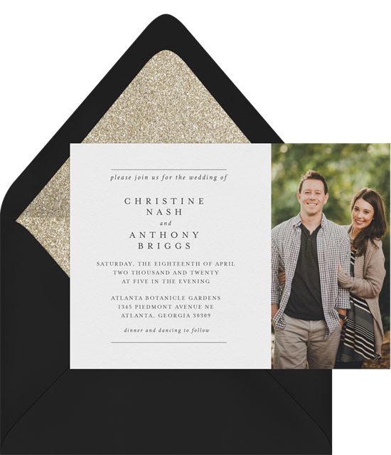Wedding words: A wedding invitation with a photo and envelope