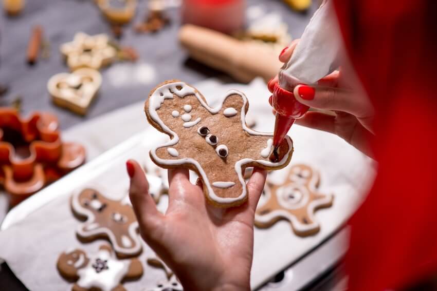 Christmas games for adults: person making ginger cookies