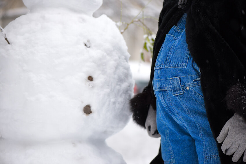 Pregnant woman and a snowman