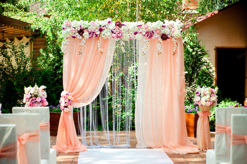 Rose gold wedding arch