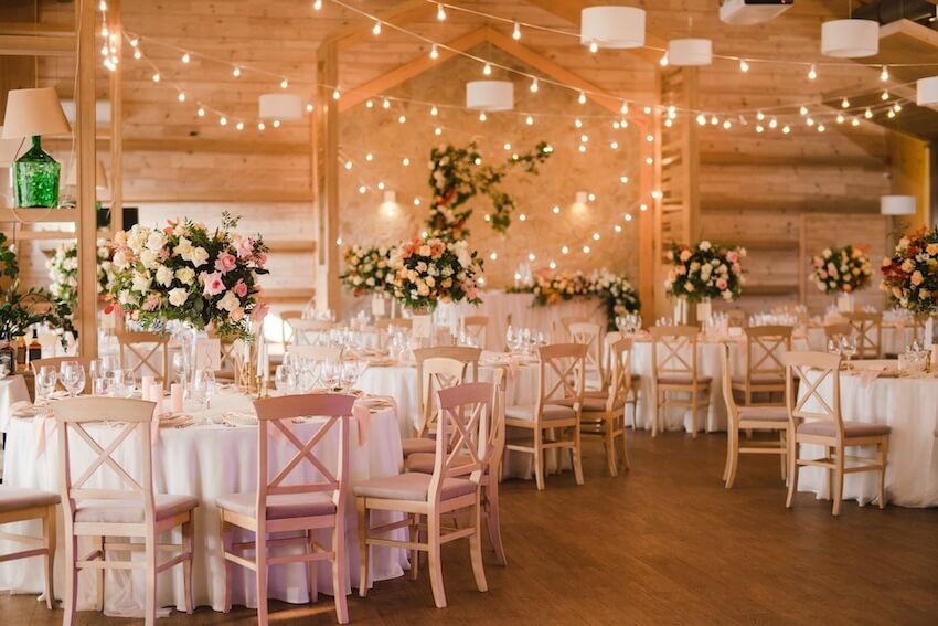 Wedding styles: rustic wedding reception with string lights