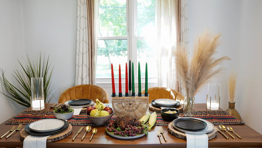Happy Kwanzaa: table setting for Kwanzaa celebration