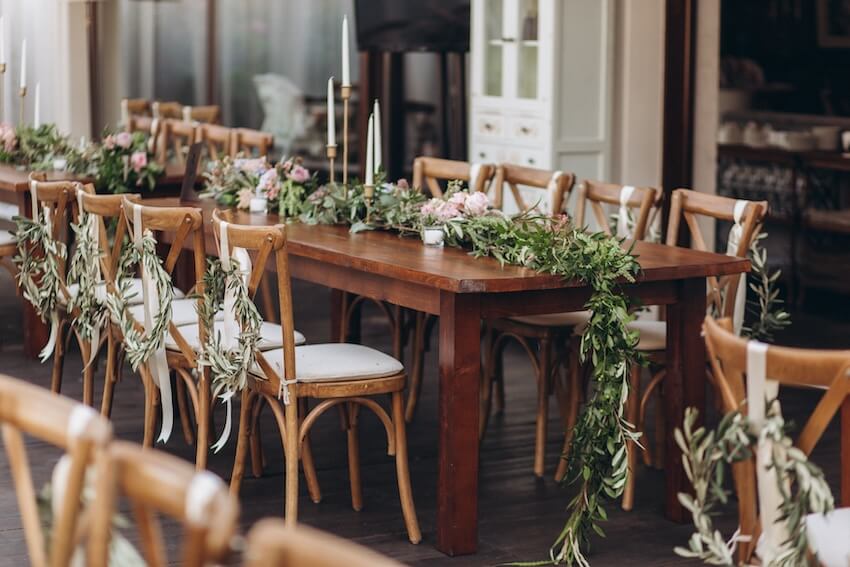 Engagement decorations: table setting with vines and flowers