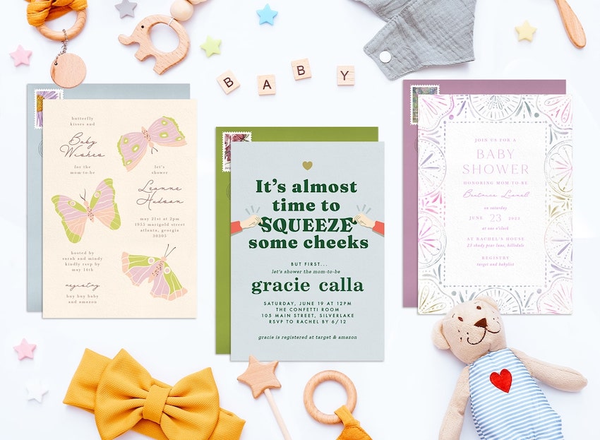 Varieties of baby shower invitations and some baby toys