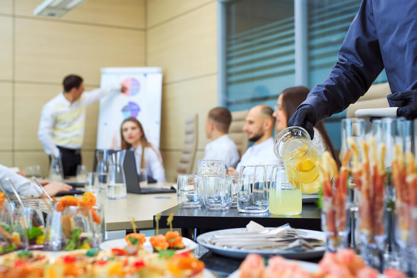 Waiter pouring drinks