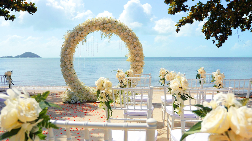 destination wedding ideas: wedding arch on the beach