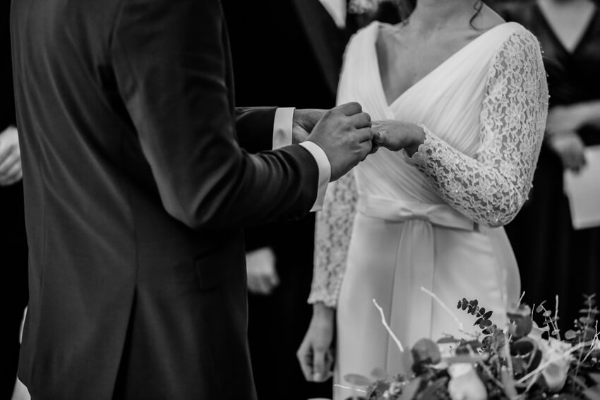 black and white wedding ceremony moment