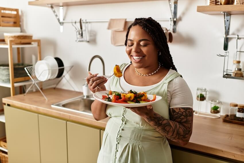 Housewarming gift ideas: woman enjoying a meal