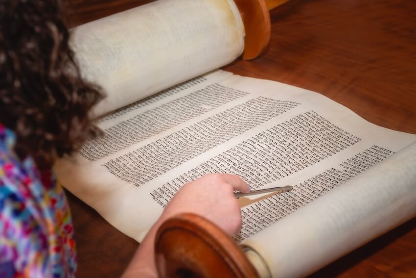 Woman reading the Torah