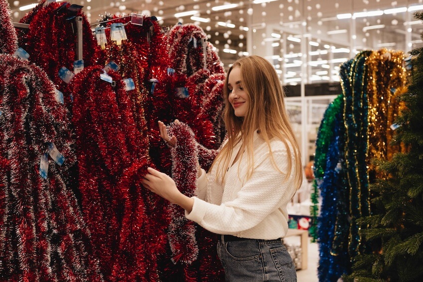 Ugly sweater party ideas: woman shopping for tinsels