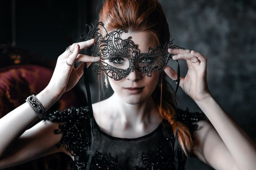 Woman wearing a black mask