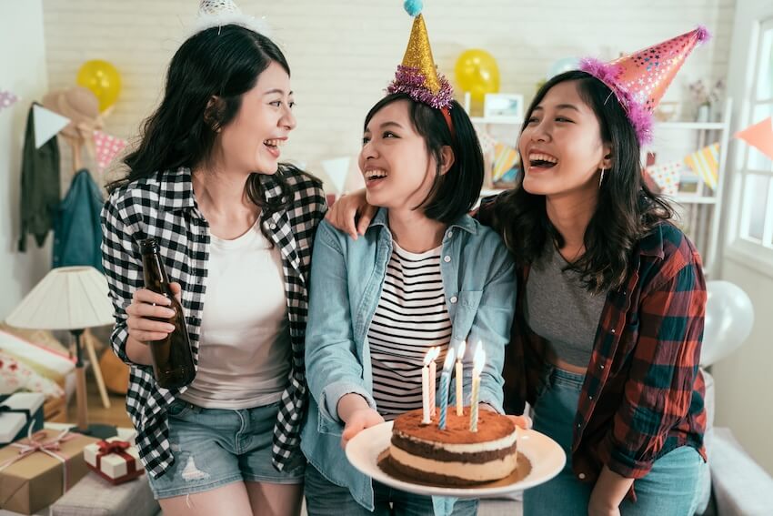 Unique birthday ideas for adults: women celebrating their friend's birthday