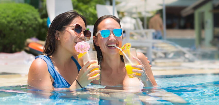 Vegas bachelorette party: women drinking while sitting in a pool