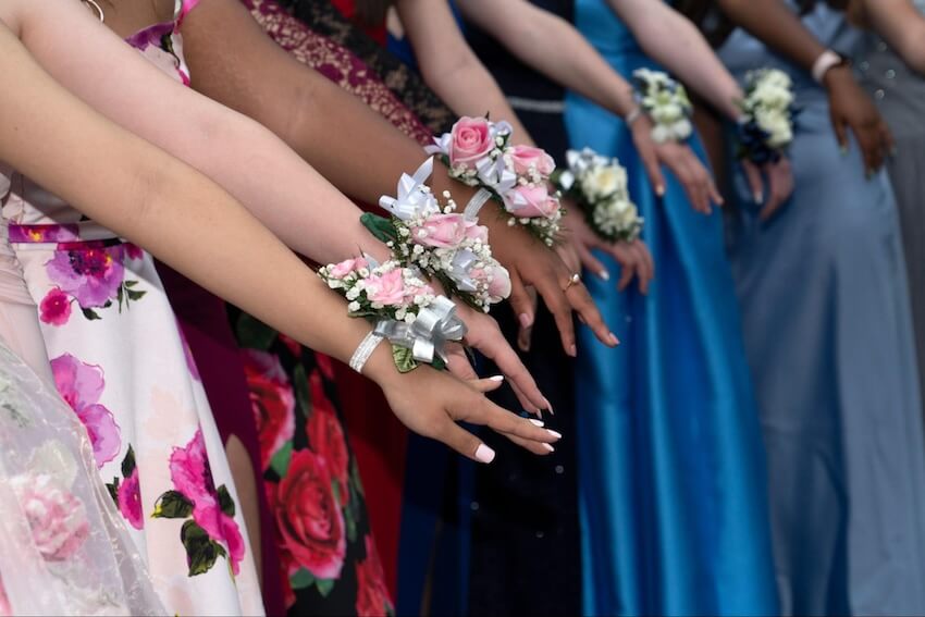 Prom send off invitations: women wearing corsages